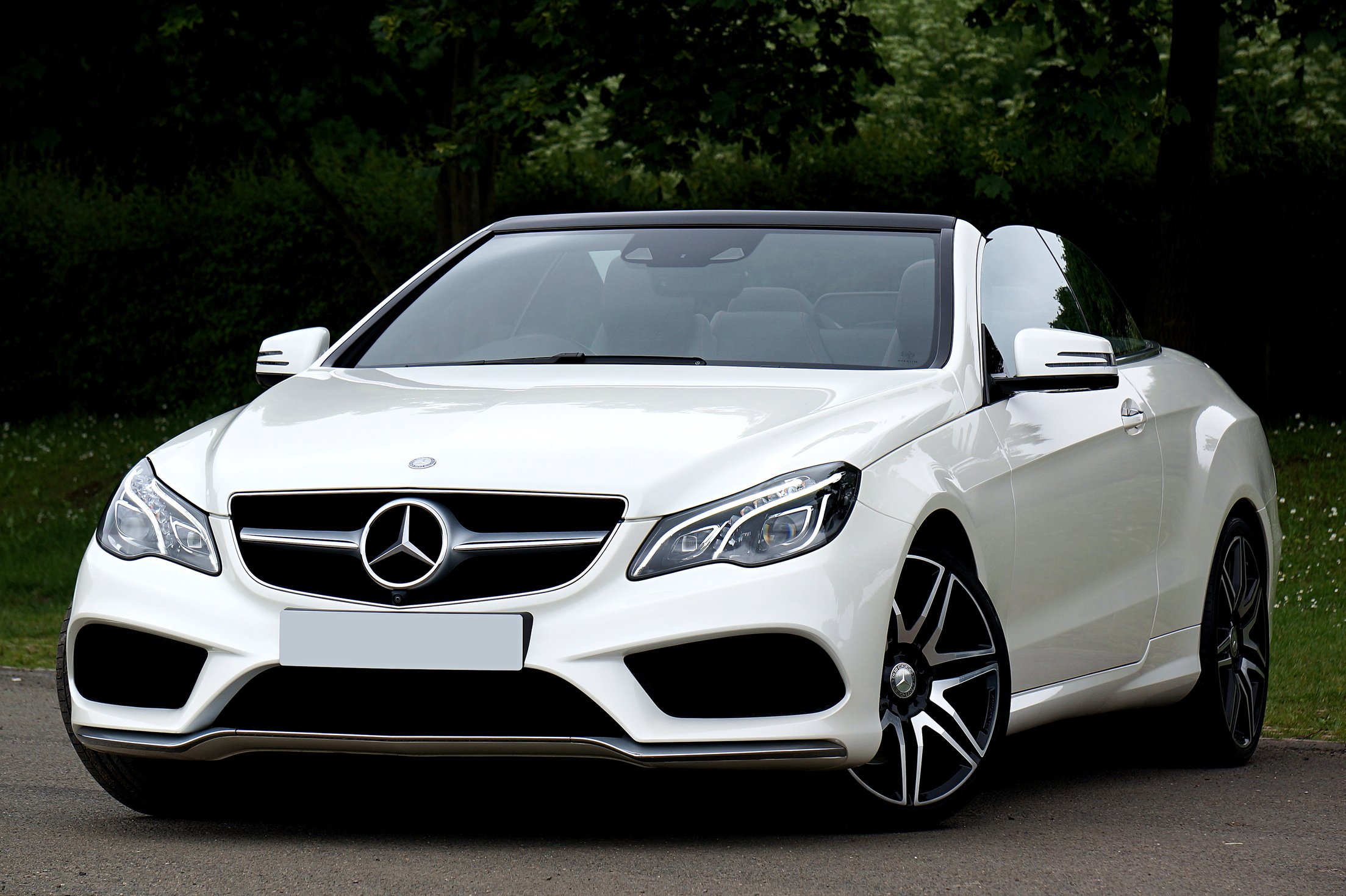 White Mercedes Benz Parked on Pavement Road